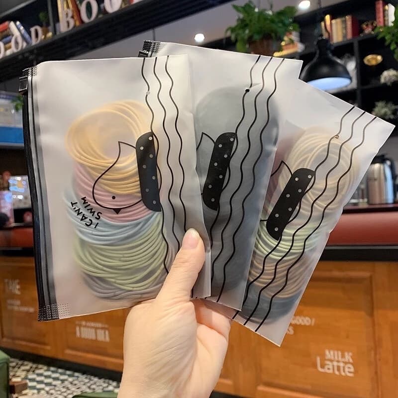 ຢາງມັດຜົມສະຕາຍເກົ່າຫລີສຳຫລັບຜູ້ຍິ່ງ ແພັກ 100ອັນ ພ້ອມຖົງໃສ່sp-A011